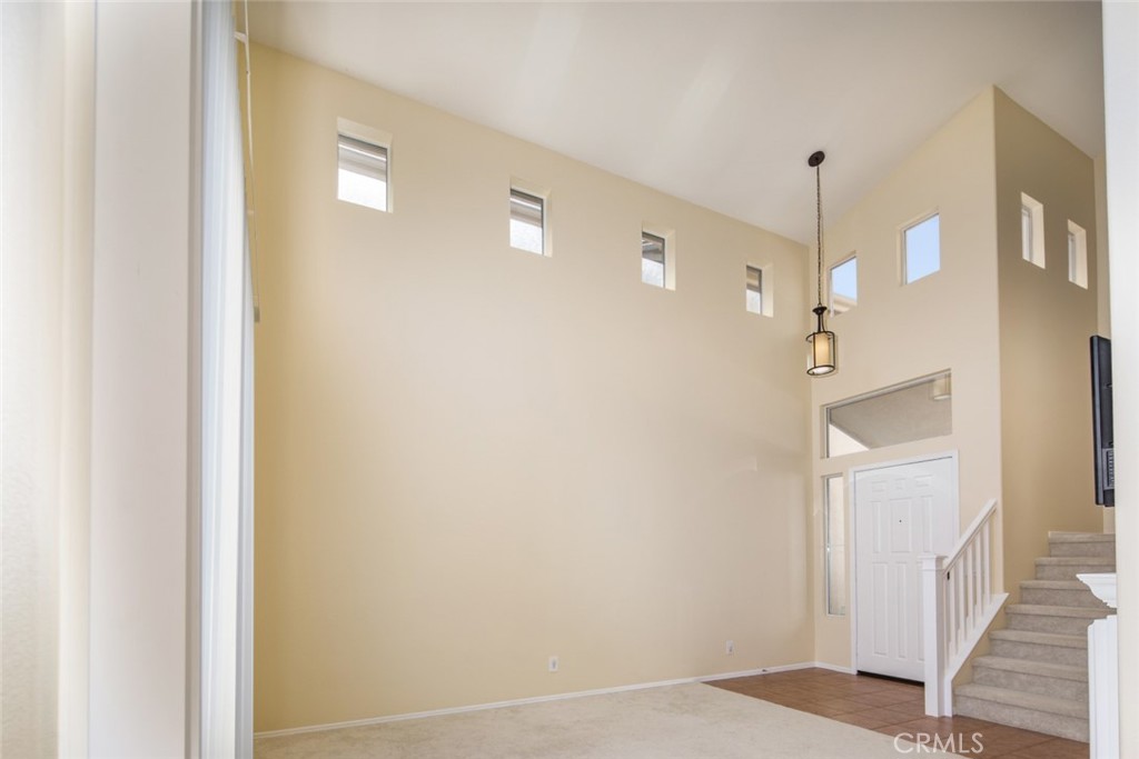 1 Quebec Aliso Viejo, CA 92656 - Photo 6 of 40 a view of a hallway with wooden floor