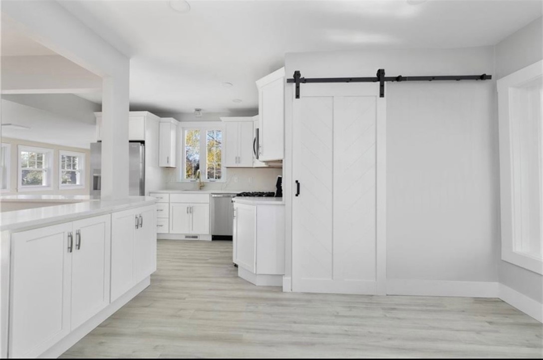 29 Burt Street Warwick, RI 02886 - Photo 23 of 49 Kitchen area/First floor bathroom