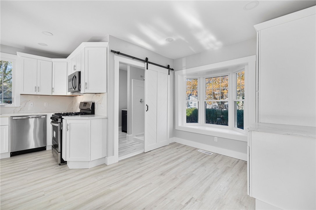 29 Burt Street Warwick, RI 02886 - Photo 25 of 49 Kitchen area/First floor bathroom