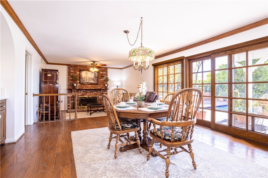 18924 Granada Circle Porter Ranch, CA 91326 - Photo 13 of 45 a view of a dining room with furniture window and wooden floor