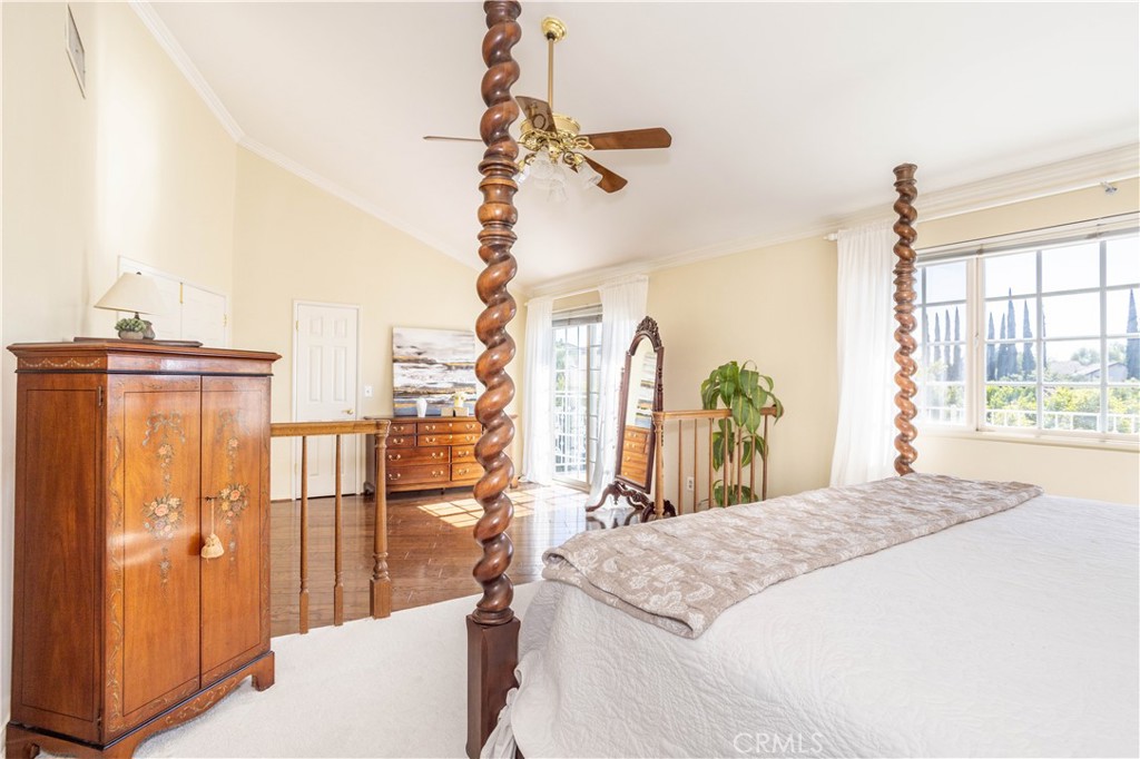 18924 Granada Circle Porter Ranch, CA 91326 - Photo 26 of 45 a bedroom with a bed and a window