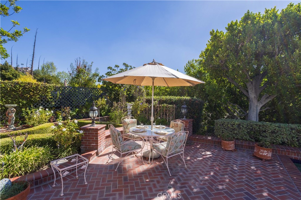 18924 Granada Circle Porter Ranch, CA 91326 - Photo 38 of 45 a view of backyard with seating space and trees