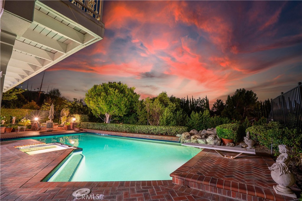 18924 Granada Circle Porter Ranch, CA 91326 - Photo 42 of 45 a view of a backyard with swimming pool
