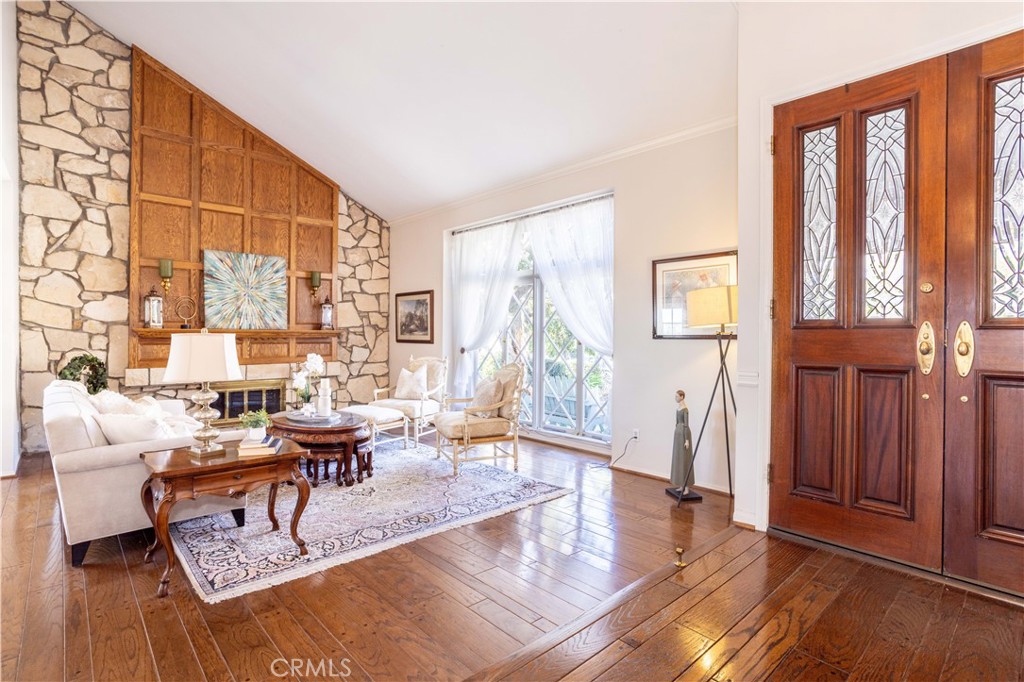 18924 Granada Circle Porter Ranch, CA 91326 - Photo 5 of 45 a living room with furniture and a large window