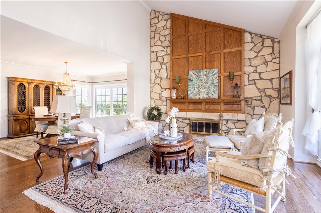 18924 Granada Circle Porter Ranch, CA 91326 - Photo 6 of 45 a living room with furniture a rug and a window