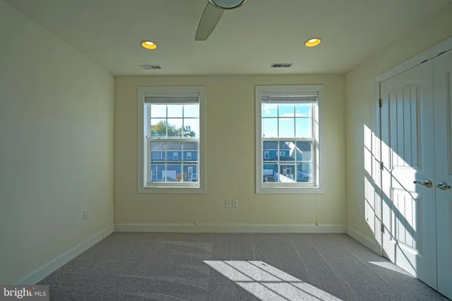 an empty room with windows