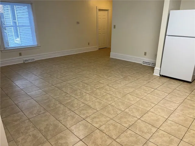 an empty room and a window