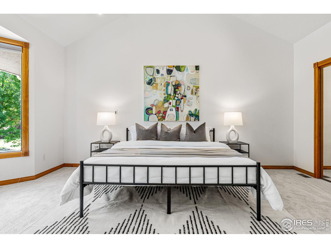 6968 Springhill Drive Niwot, CO 80503 - Photo 16 of 40 a living room with a table and a potted plant
