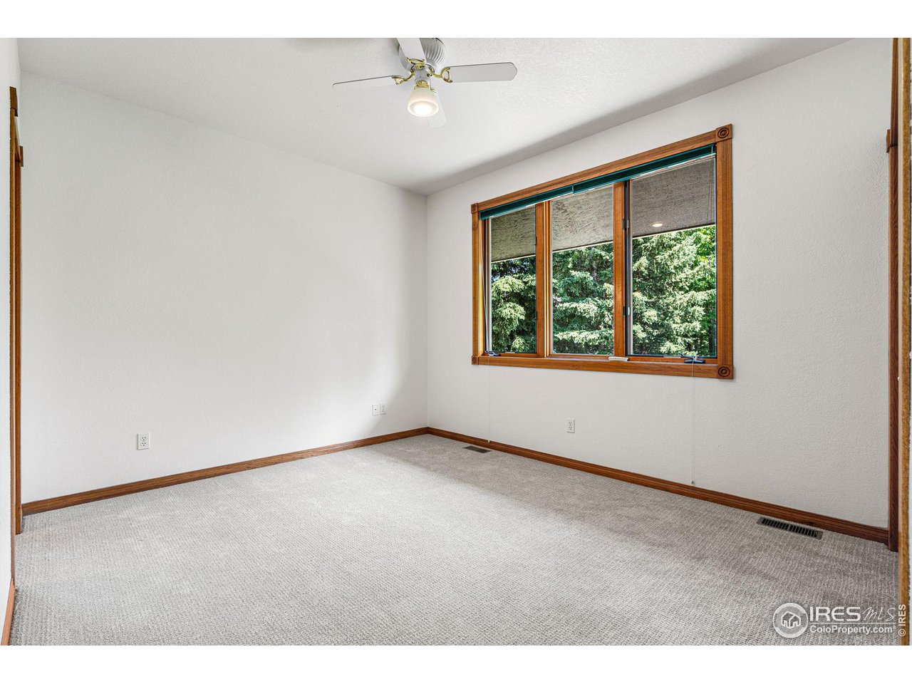 6968 Springhill Drive Niwot, CO 80503 - Photo 26 of 40 a view of an empty room with a window