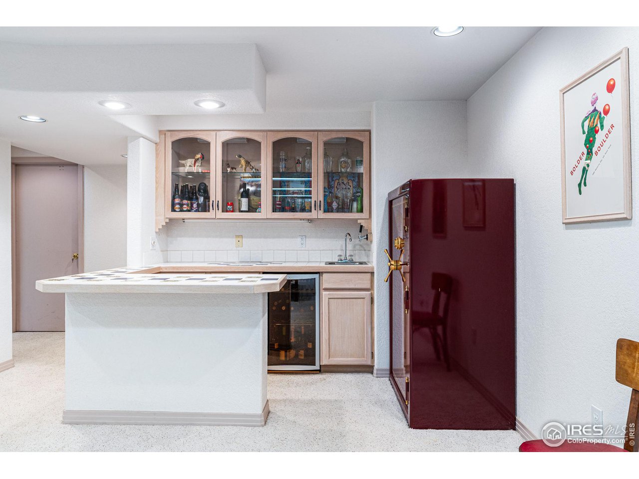 6968 Springhill Drive Niwot, CO 80503 - Photo 28 of 40 a kitchen with stainless steel appliances granite countertop a refrigerator and a sink