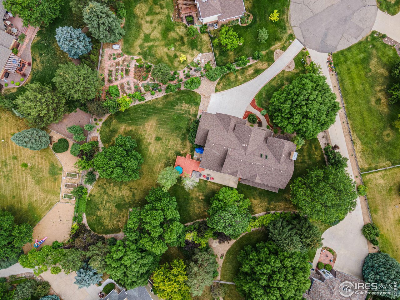 6968 Springhill Drive Niwot, CO 80503 - Photo 34 of 40 an aerial view of a house with outdoor space