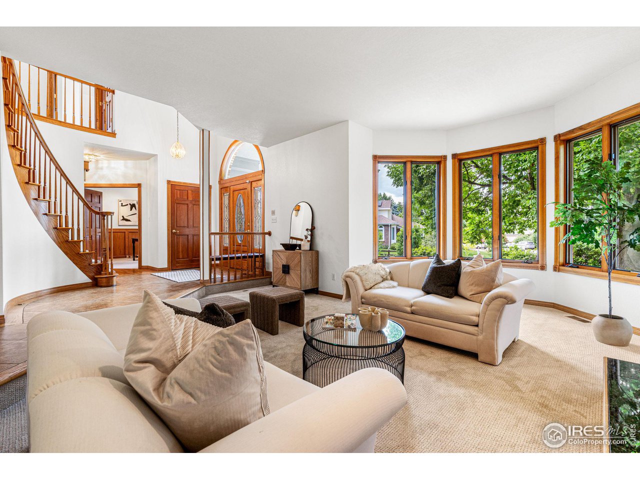 6968 Springhill Drive Niwot, CO 80503 - Photo 5 of 40 a living room with furniture and a large window