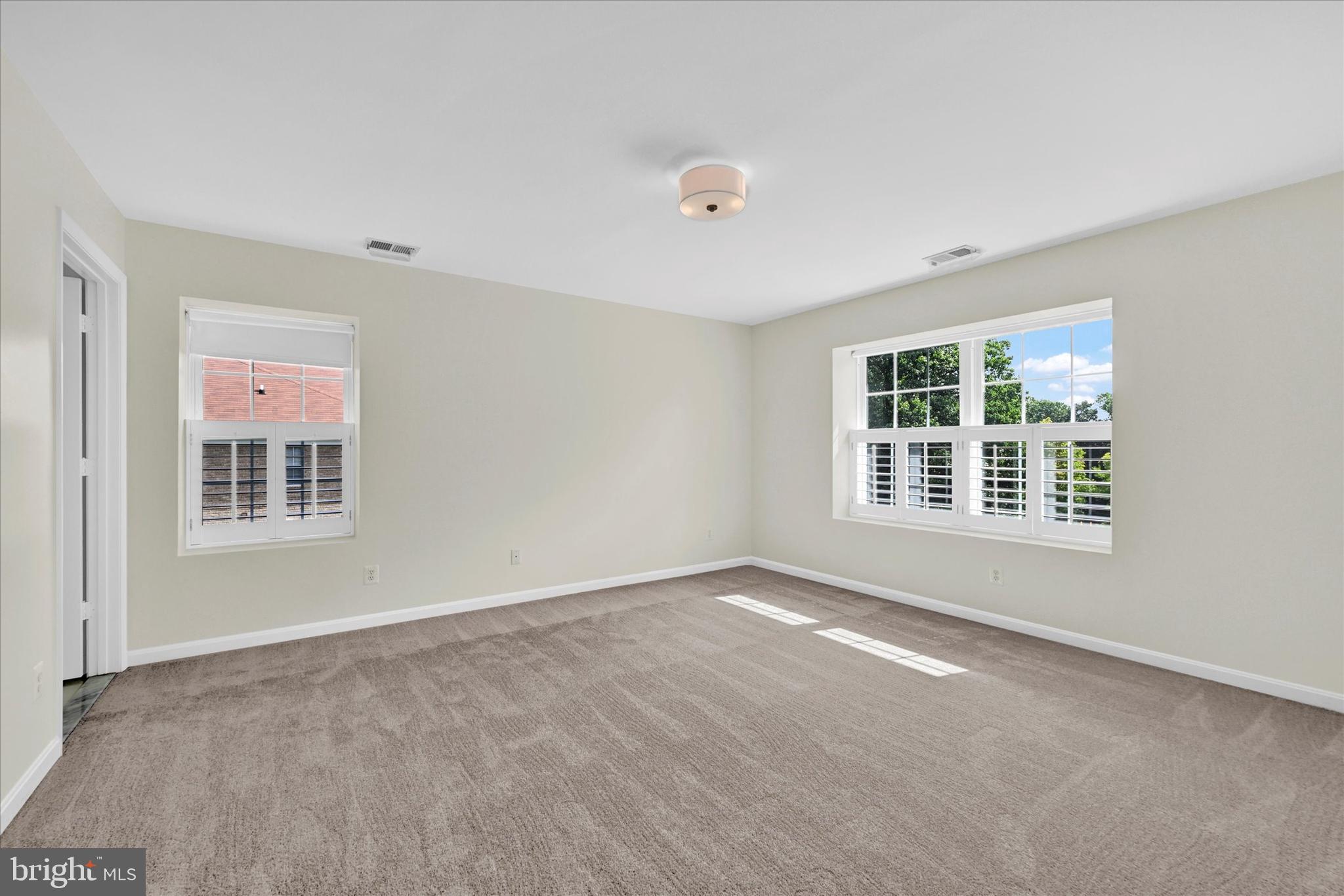 12350 Rosslare Ridge Road, Unit 304 Lutherville-Timonium, MD 21093 - Photo 15 of 27 The primary bedroom has windows on 2 walls!