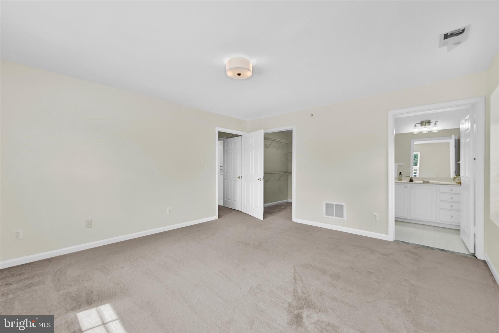 12350 Rosslare Ridge Road, Unit 304 Lutherville-Timonium, MD 21093 - Photo 16 of 27 New lighting and access to closet & en-suite bath.