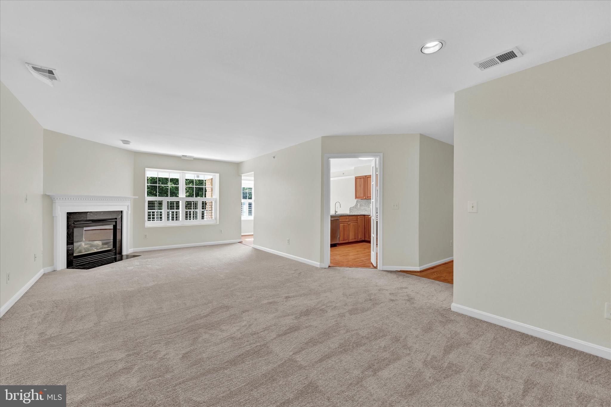 12350 Rosslare Ridge Road, Unit 304 Lutherville-Timonium, MD 21093 - Photo 2 of 27 Livable layout with cozy fireplace & great light.