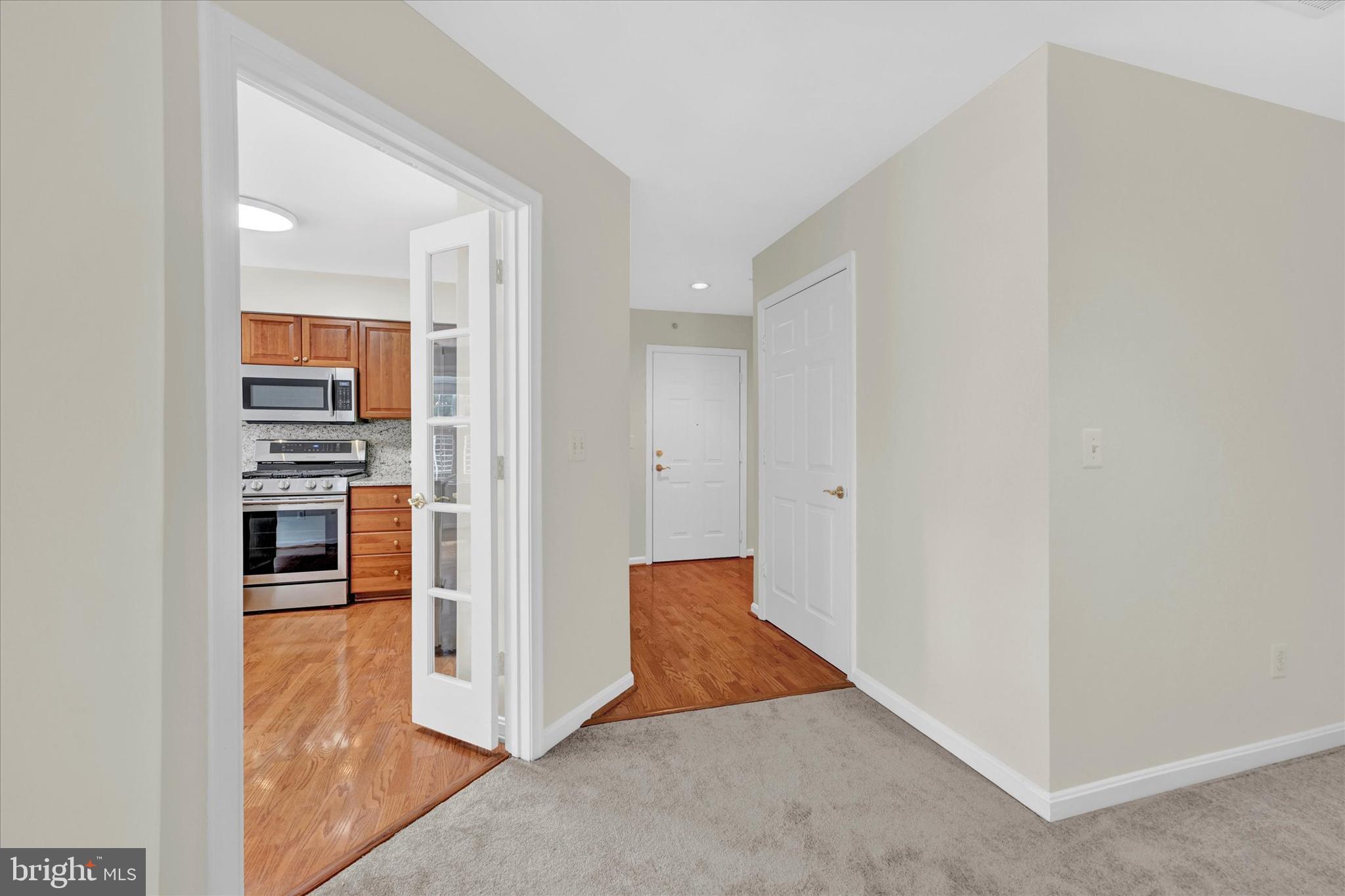 12350 Rosslare Ridge Road, Unit 304 Lutherville-Timonium, MD 21093 - Photo 23 of 27 Foyer has a coat closet & access to laundry room.