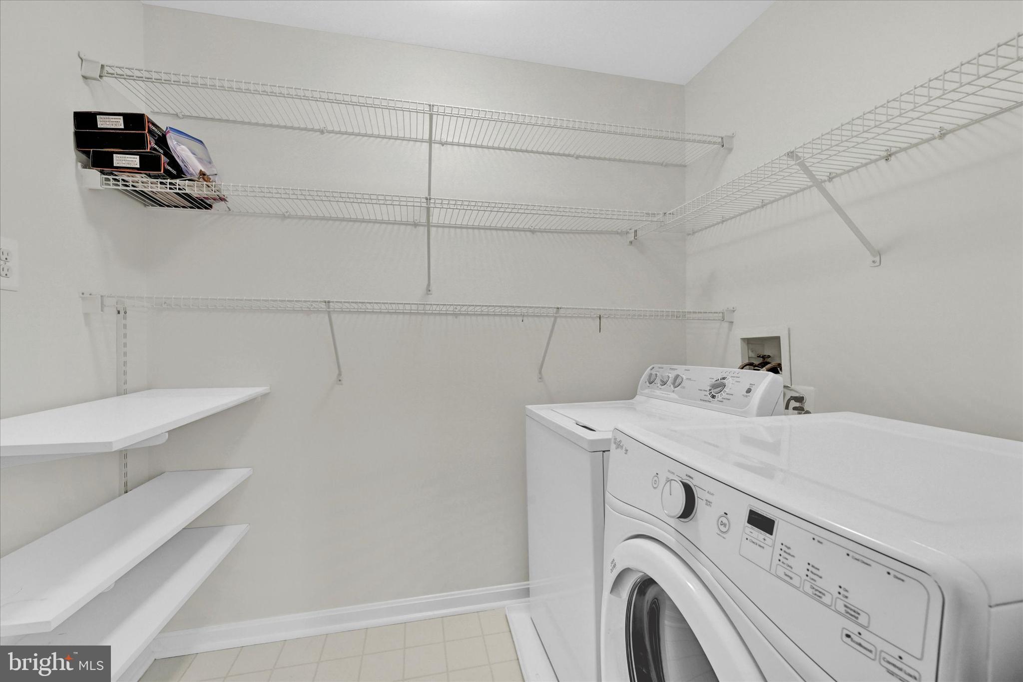 12350 Rosslare Ridge Road, Unit 304 Lutherville-Timonium, MD 21093 - Photo 24 of 27 And the laundry room has nice storage potential.