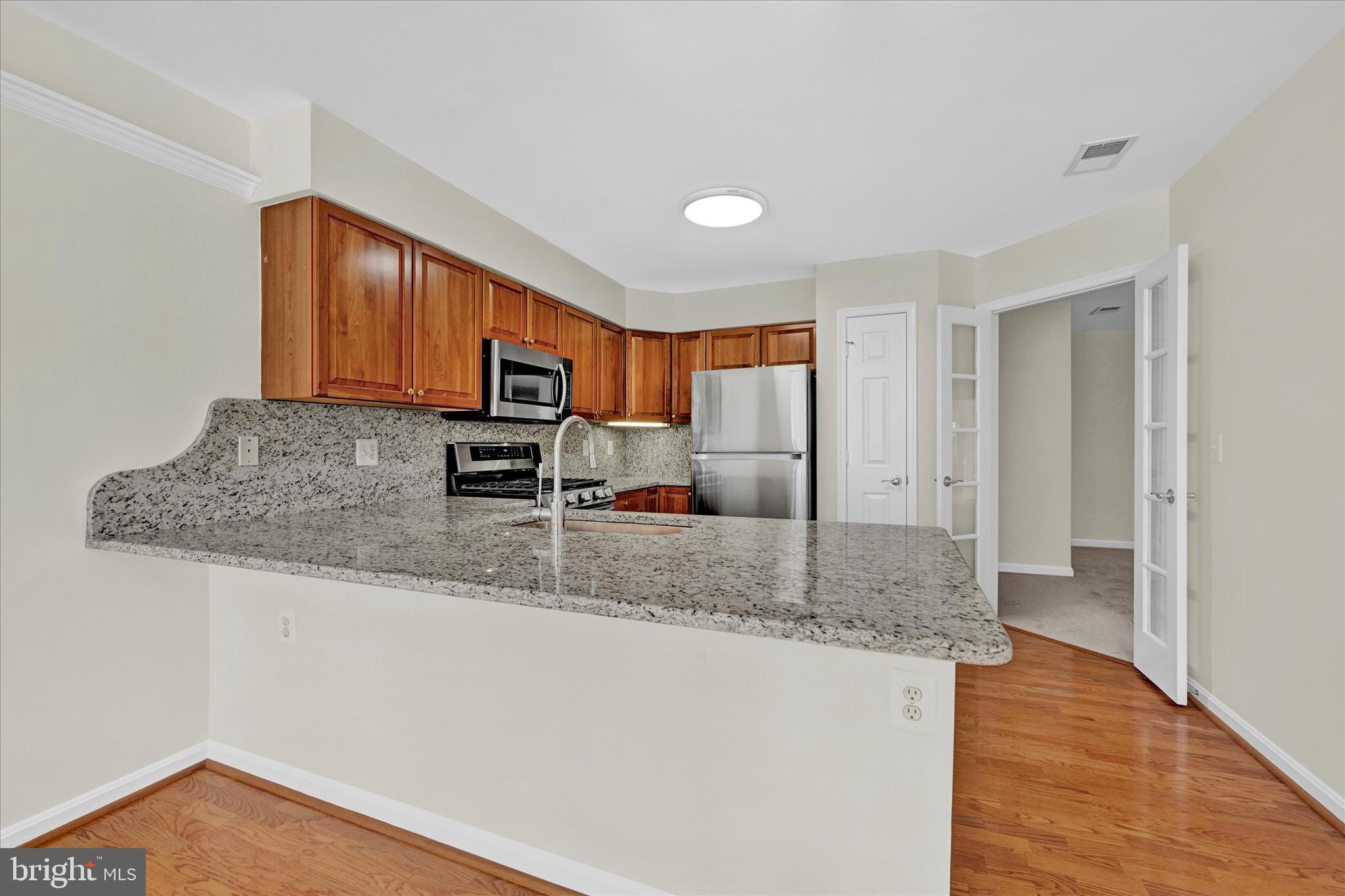 12350 Rosslare Ridge Road, Unit 304 Lutherville-Timonium, MD 21093 - Photo 7 of 27 Picture you & yours at the breakfast bar...