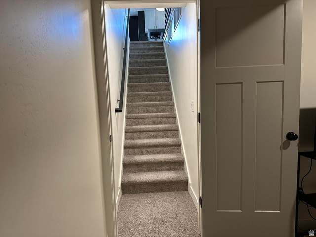 4349 Half Mile Road East Enoch, UT 84721 - Photo 27 of 36 Stairway with carpet floors