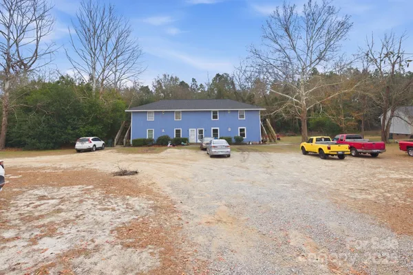 a car parked in front of a house