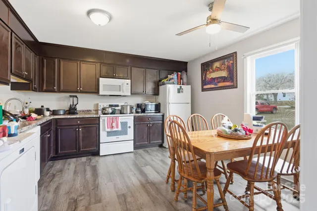 a kitchen with a sink cabinets and appliances