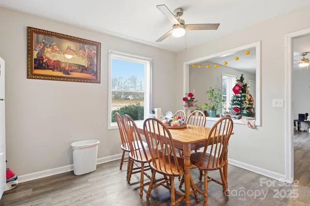 a kitchen with stainless steel appliances granite countertop a refrigerator sink and cabinets