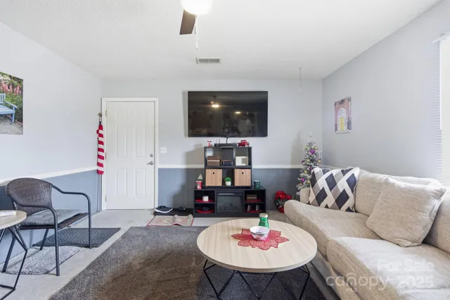 a living room with furniture and a couch