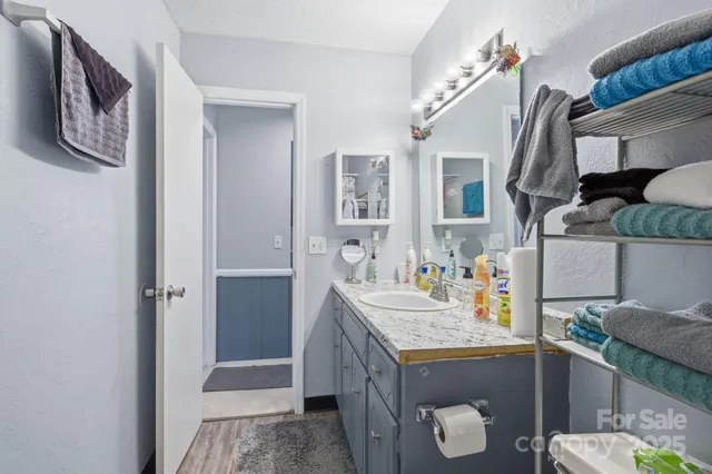 a living room filled with furniture and wooden floor