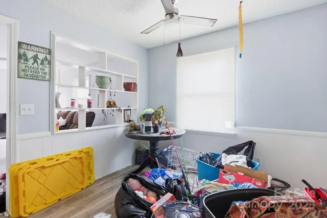 a room with toys and wooden floor