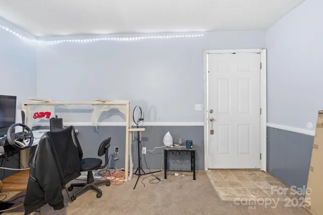 a view of a storage & utility room with toys