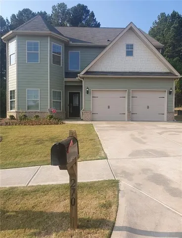 a front view of house with yard