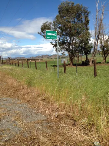 a view of yard with swimming pool