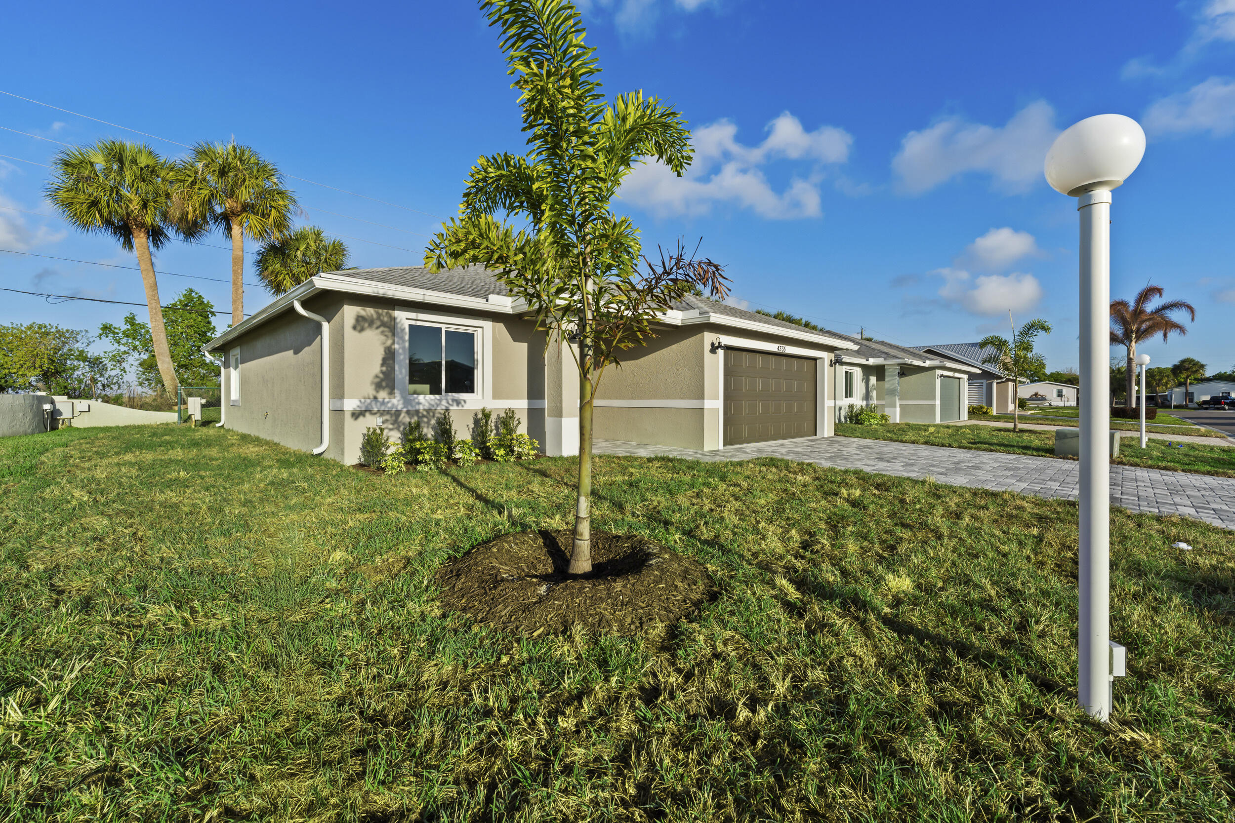 4335 Southwest 15th Way Okeechobee, FL 34974 - Photo 3 of 33 a house view with a garden space