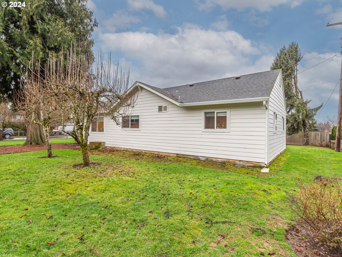 205 North 9th Avenue Ridgefield, WA 98642 - Photo 32 of 48 a view of a house with a yard