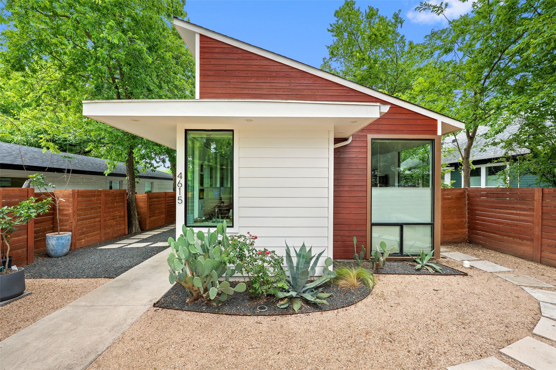 4615 Depew Avenue Austin, TX 78751 - Photo 11 of 40 Front of home with native landscaping and gated front yard