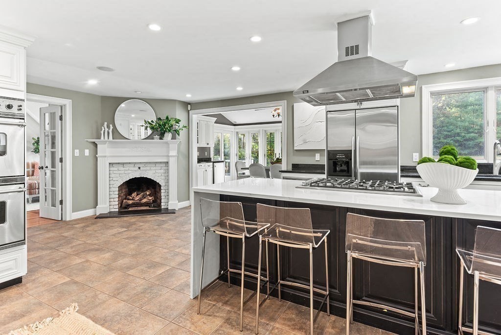 10 Stop River Road Norfolk, MA 02056 - Photo 5 of 29 a kitchen with a sink and a stove