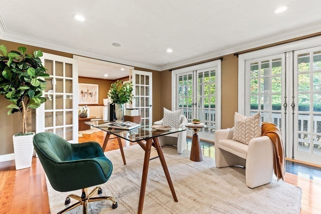 10 Stop River Road Norfolk, MA 02056 - Photo 10 of 29 a living room with furniture and a large window