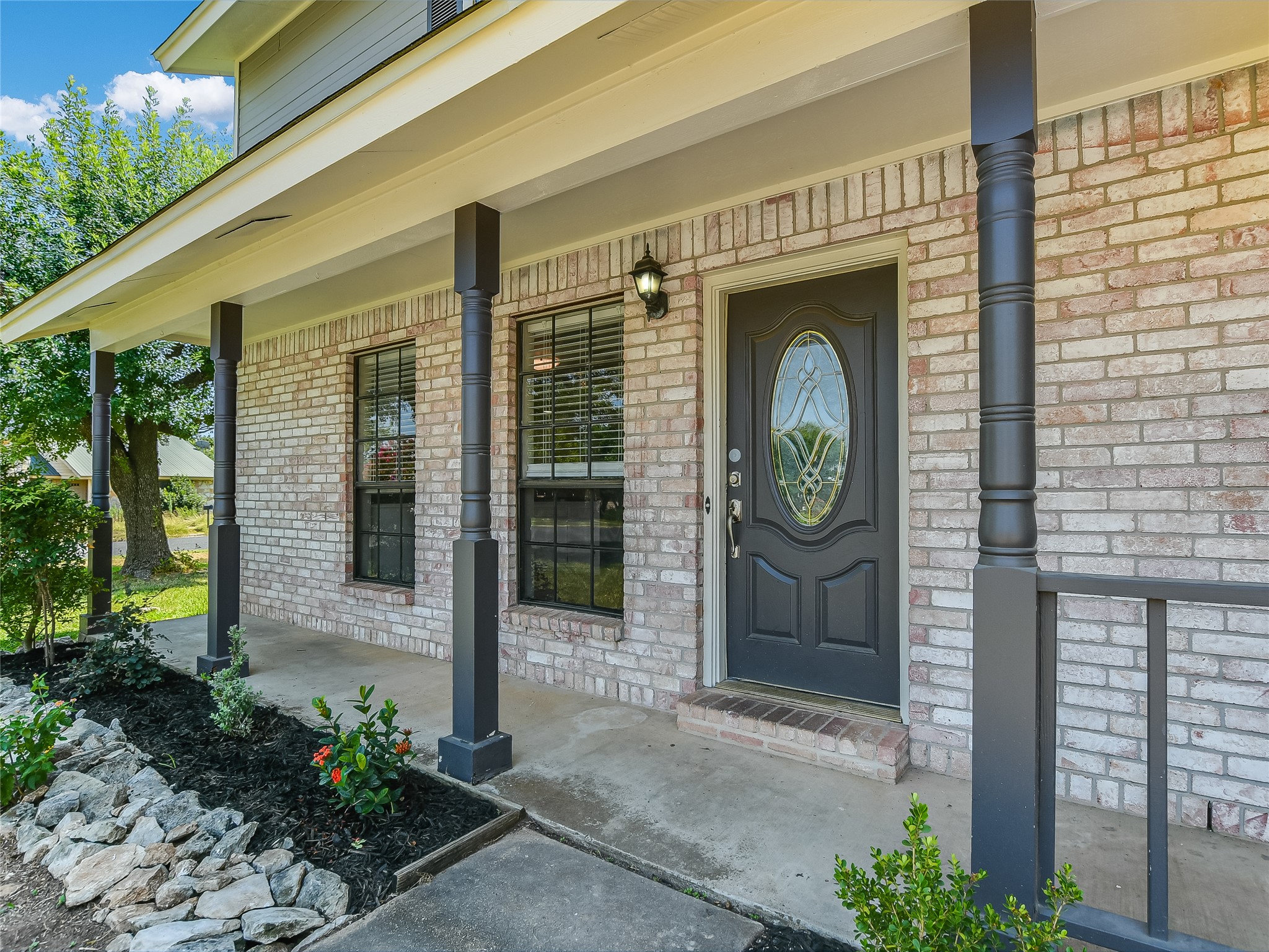300 North Field Street Round Rock, TX 78681 - Photo 4 of 26 Welcoming covered front porch.