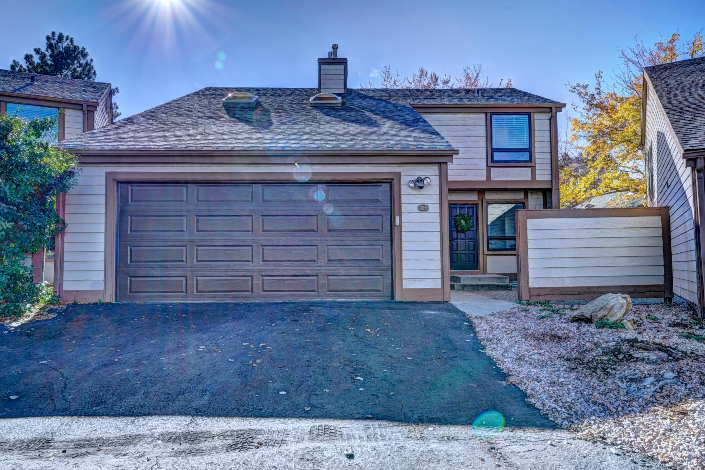 397 Ridge Cir Drive, Unit 8 Grand Junction, CO 81507 - Photo 1 of 40 a view of a house with large windows