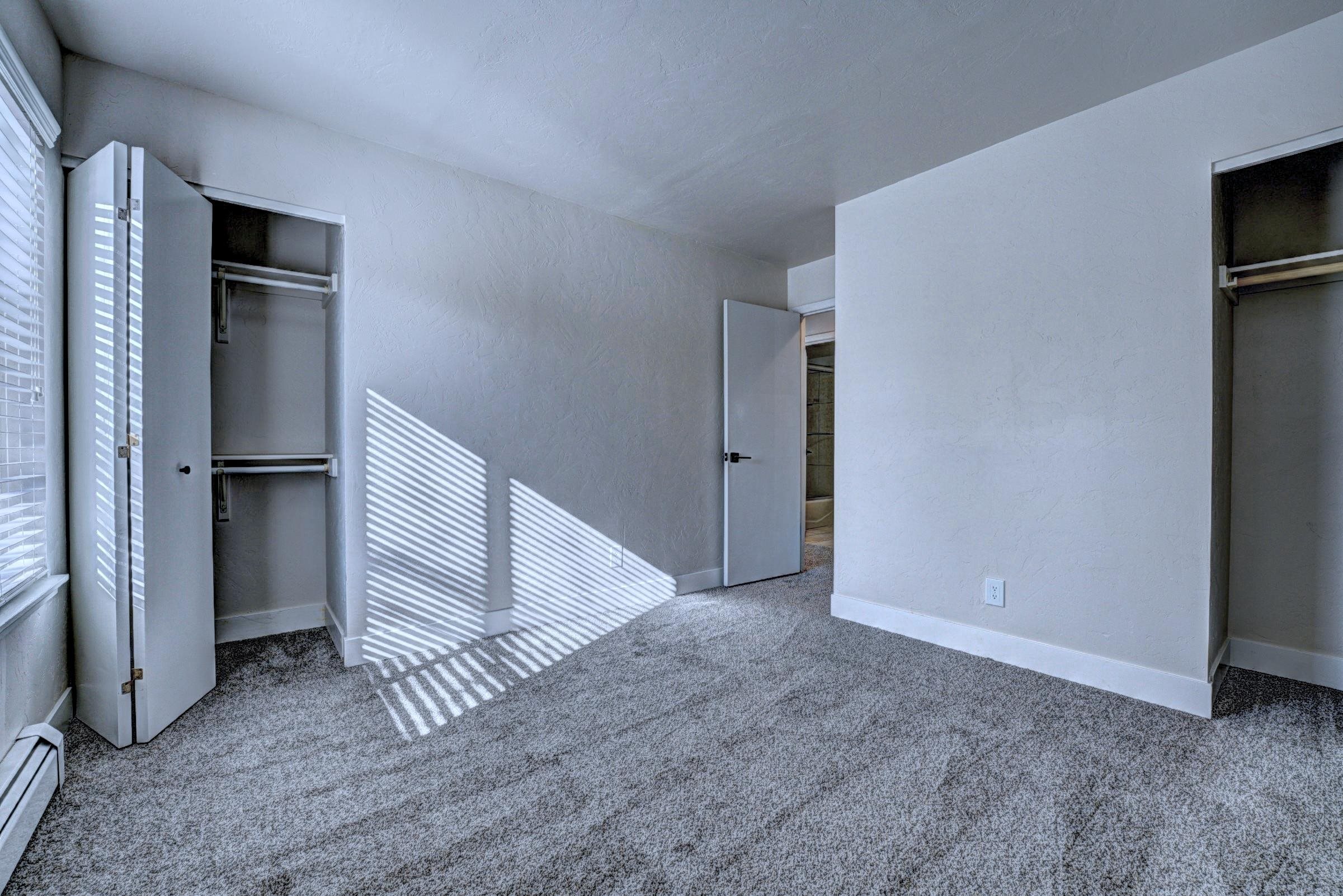 397 Ridge Cir Drive, Unit 8 Grand Junction, CO 81507 - Photo 24 of 40 a view of an empty room with stairs and a room