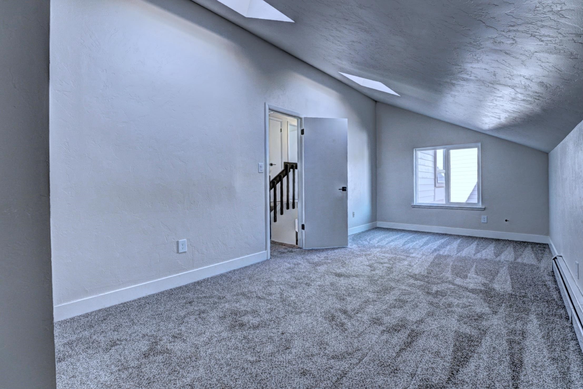 397 Ridge Cir Drive, Unit 8 Grand Junction, CO 81507 - Photo 28 of 40 a view of an empty room with window