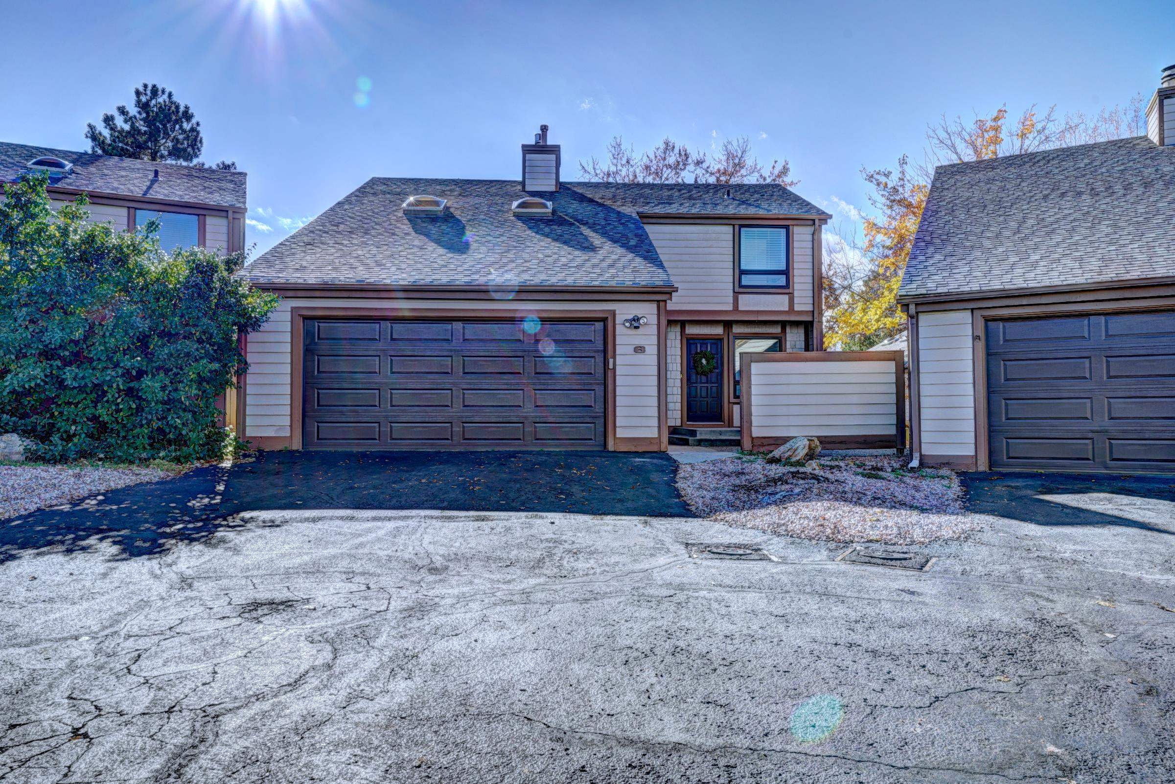 397 Ridge Cir Drive, Unit 8 Grand Junction, CO 81507 - Photo 37 of 40 a front view of a house with garden