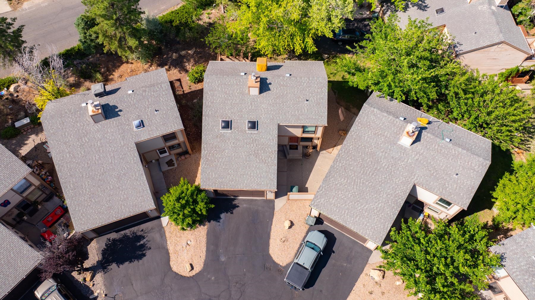 397 Ridge Cir Drive, Unit 8 Grand Junction, CO 81507 - Photo 39 of 40 an aerial view of a house with outdoor space and seating area