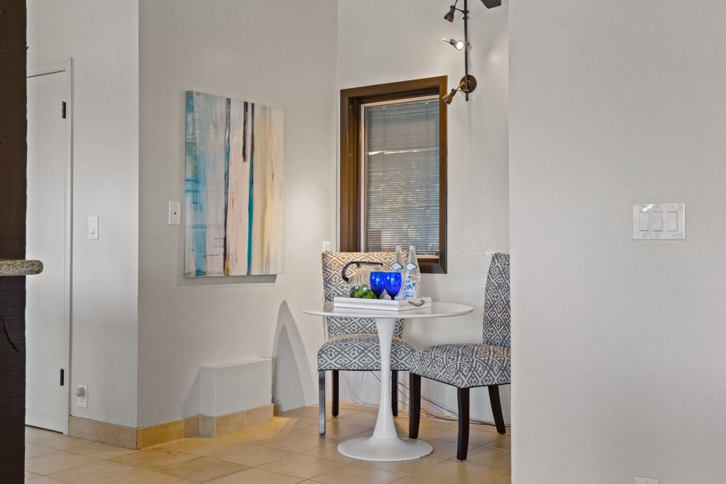 1390 Weston Ridge Road Scotts Valley, CA 95066 - Photo 13 of 55 a room with a table and windows