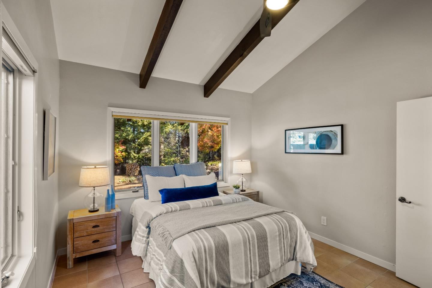 1390 Weston Ridge Road Scotts Valley, CA 95066 - Photo 25 of 55 a bedroom with a bed and a window