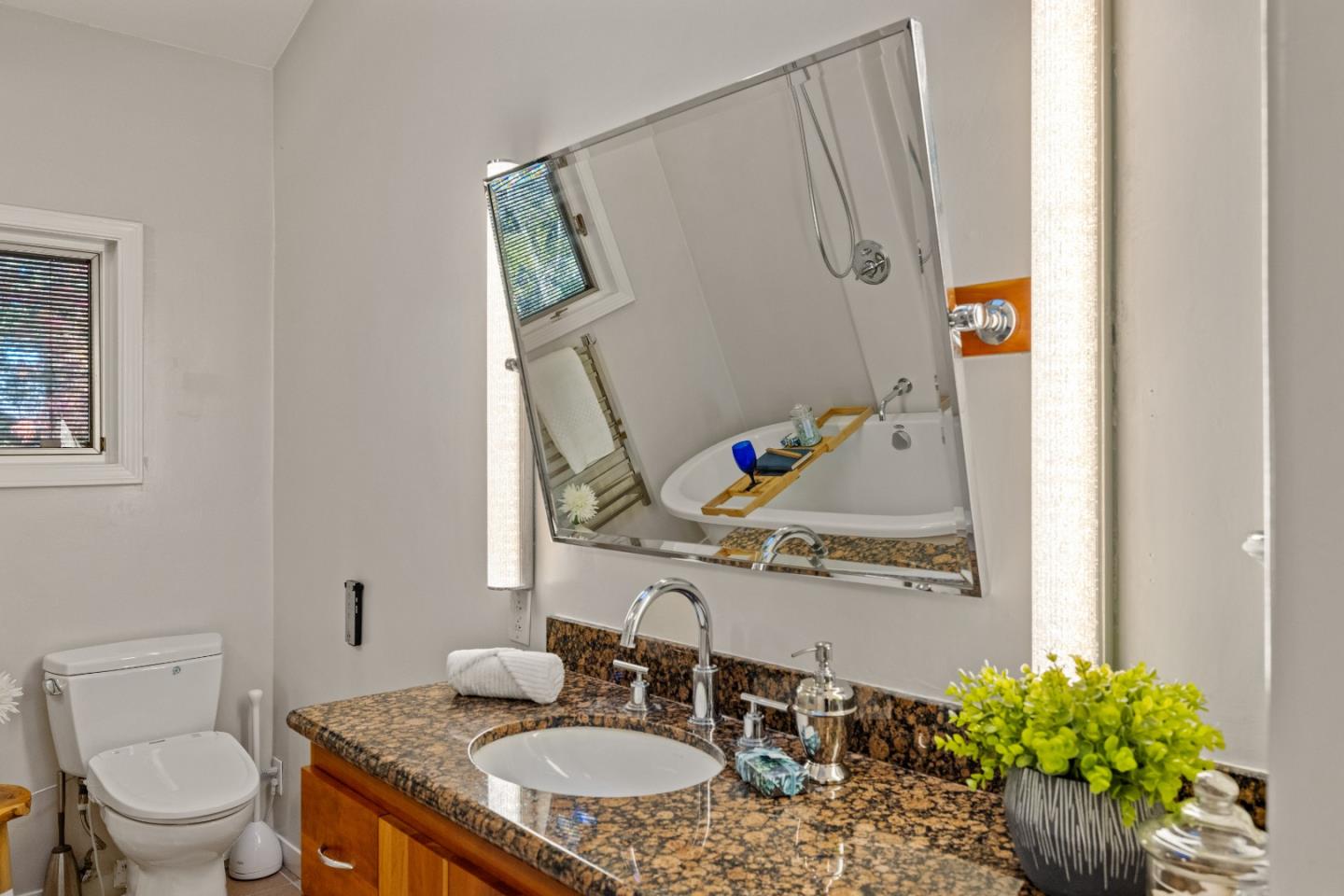 1390 Weston Ridge Road Scotts Valley, CA 95066 - Photo 26 of 55 a bathroom with a granite countertop sink and a mirror