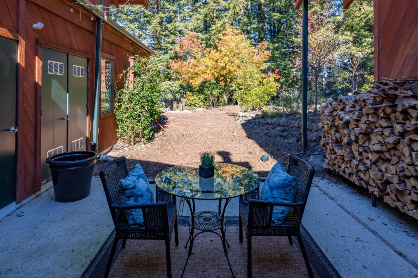 1390 Weston Ridge Road Scotts Valley, CA 95066 - Photo 39 of 55 a outdoor dining space with furniture and potted plants