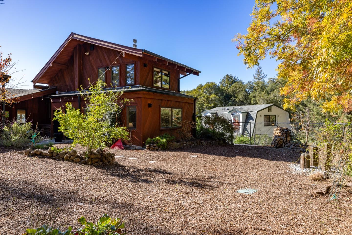 1390 Weston Ridge Road Scotts Valley, CA 95066 - Photo 40 of 55 a front view of a house with a yard