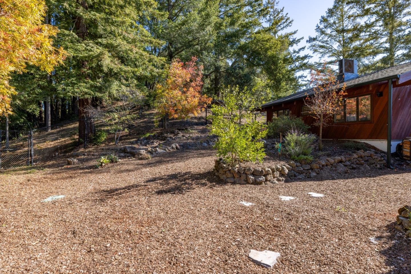 1390 Weston Ridge Road Scotts Valley, CA 95066 - Photo 41 of 55 a backyard of a house with lots of green space