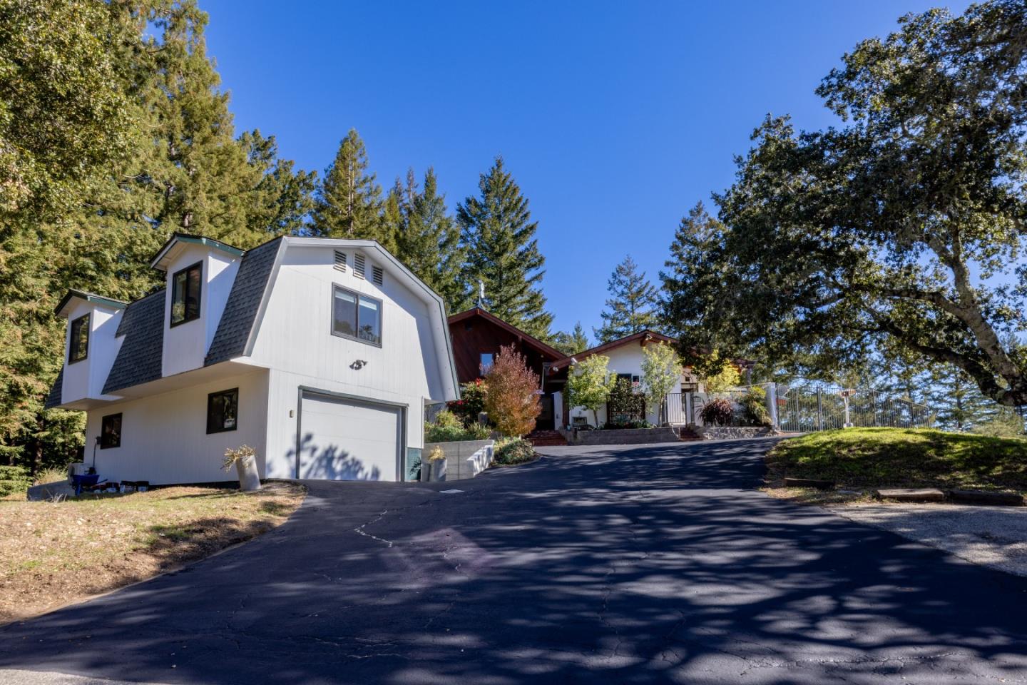 1390 Weston Ridge Road Scotts Valley, CA 95066 - Photo 50 of 55 a view of a house with a yard